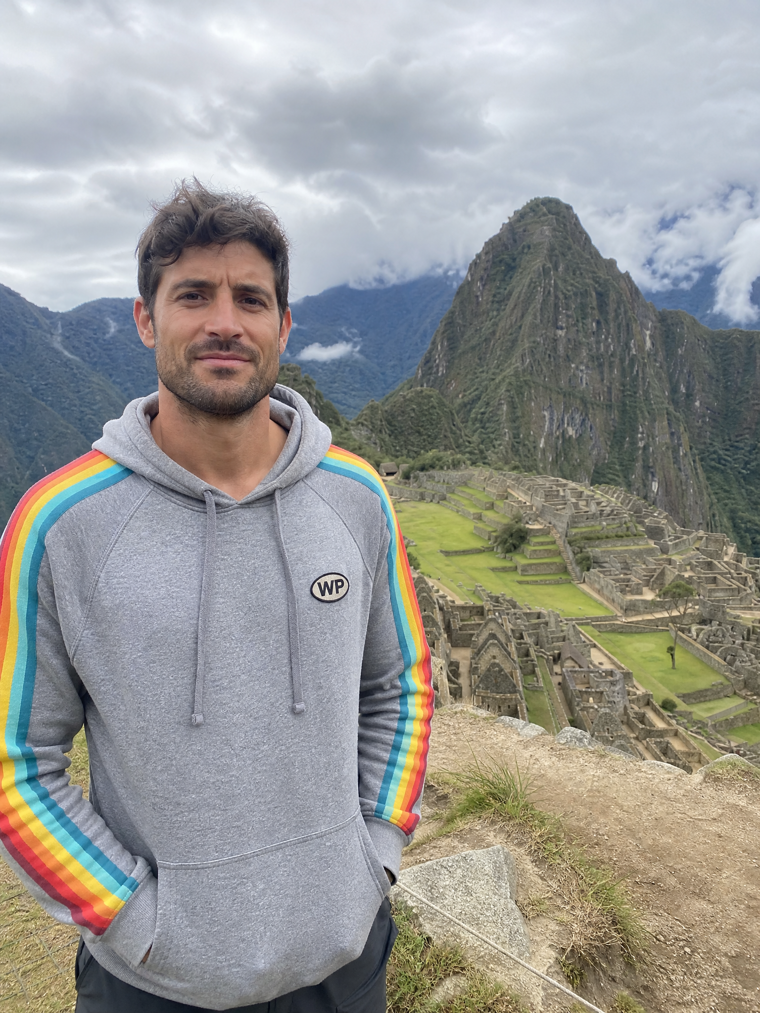 Marco R. wearing Wunderpath gear at Machu Picchu, Peru